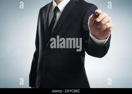 Businessman writing Stock Photo
