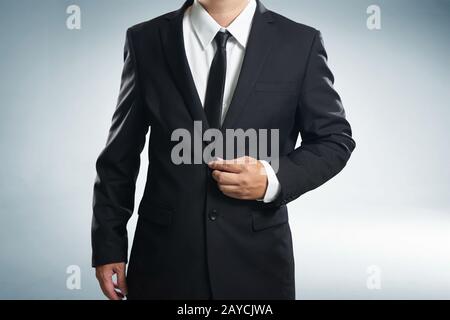 Confidence businessman in black suit Stock Photo