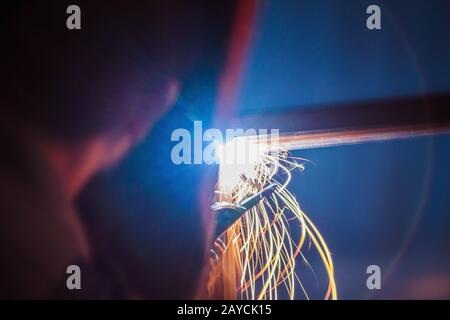 a men welding on work Stock Photo