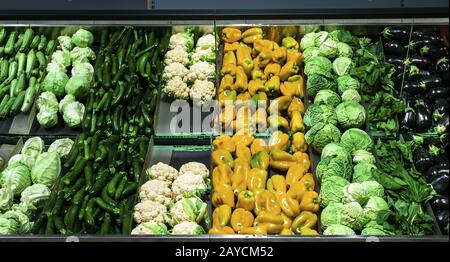 Vegetables on shelf in supermarket. Stock Photo