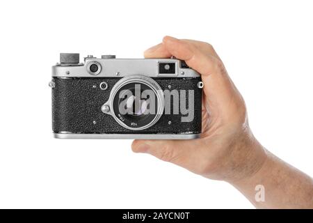 Vintage photo camera in hand Stock Photo