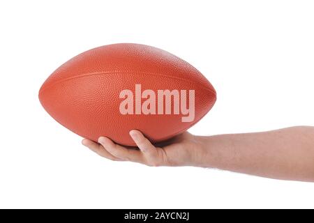 Hand and rugby ball Stock Photo - Alamy