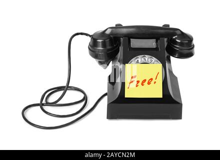 Vintage telephone and paper Free Stock Photo