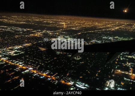 Las Vegas City lights from airplane at night by Alex Grichenko