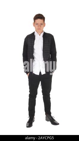 Serious young teenager boy standing in the studio Stock Photo