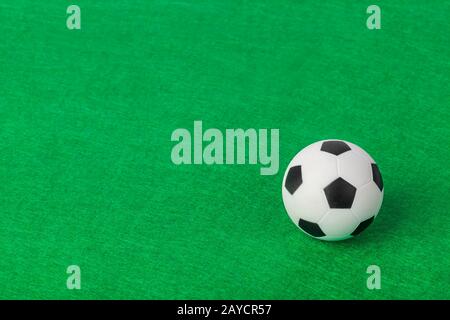 Soccer ball on football field Stock Photo