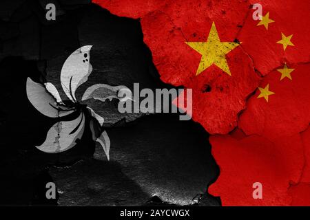 flags of Hong Kong and China painted on cracked wall Stock Photo