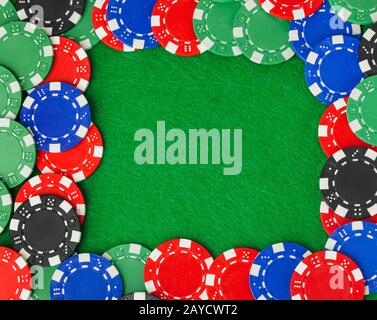 Frame made of casino chips on green table Stock Photo