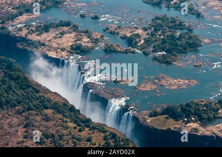 Victoria Falls Aerial View, Zambezi River Waterfall, between Zimbabwe and Zambia, Africa, a World Famous Tourist Attraction Stock Photo