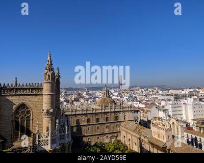 Seville cathedral and the City skyline Stock Photo