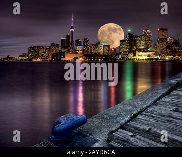 CN Tower with a full moon at night - Toronto, Ontario, Canada Stock ...