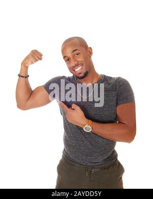 African man showing his muscles and smiling Stock Photo