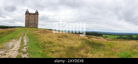 The Cage tower and surrounding landscape in the distance, Peak District, UK Stock Photo