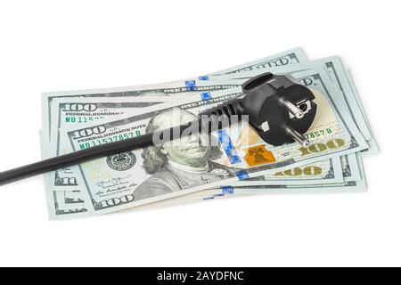 Electric plug on money Stock Photo