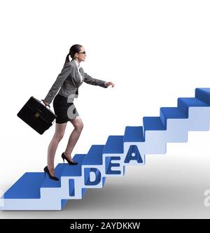 Concept of idea with businesswoman climbing steps stairs Stock Photo