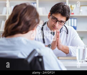 Doctor sharing discouraging lab test results to patient Stock Photo