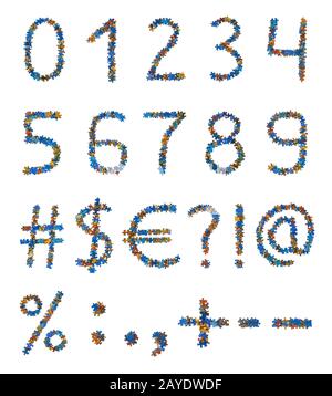 Numbers and symbols made of puzzle pieces - education concept Stock Photo