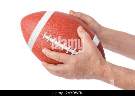 Hands and rugby ball Stock Photo