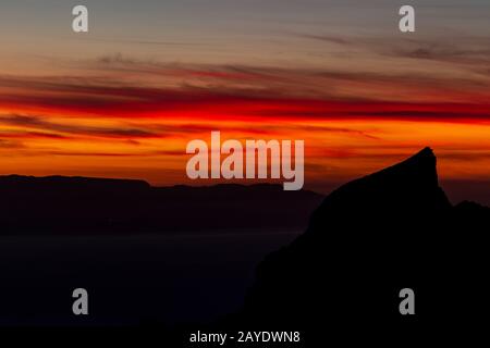 Dusk over La Gomera from Tenerife cliffs, Canary Islands Stock Photo