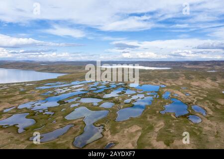 beautiful plateau wetlands against a blue sky Stock Photo