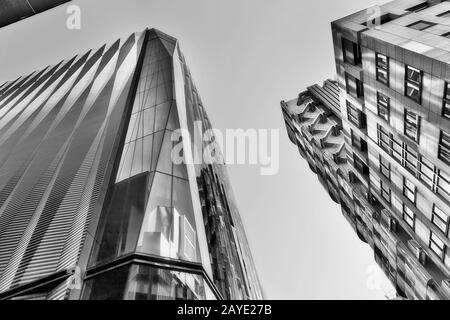 High contrast black white futuristic modern building towers in rich Tokyo district Ginza reaching the skies. Stock Photo