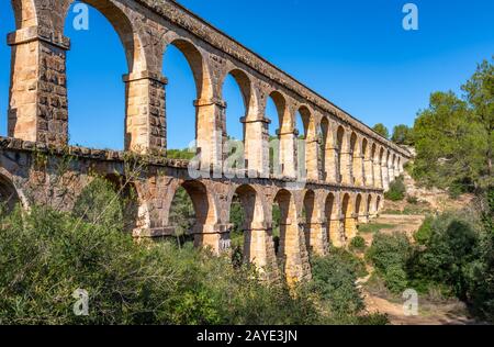 Ancient roman aqueduct Ponte del Diable or Devil's Bridge in Tarragona, Spain. Stock Photo