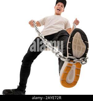 European tattooed hip male in a sporty outfit with red and black shorts and  shirt Stock Photo - Alamy