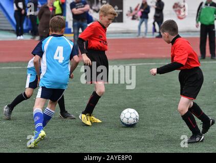 Orenburg, Russia - May 28, 2017 year: The boys play football in the preliminary games football festi Stock Photo