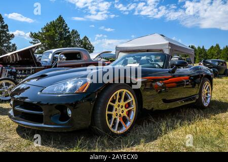 A large outdoor Rev Mountain Car and Bike Show in Lincoln, Montana Stock Photo