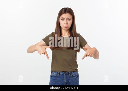 Beautiful young elegant woman over isolated background pointing hand and fingers with sad expression. Stock Photo