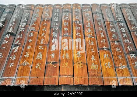 traditional scroll written on bamboo Stock Photo