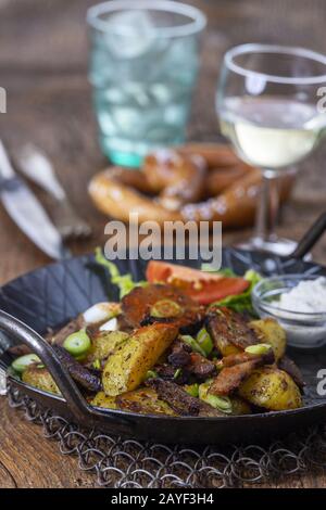 Tyrolean potatoes in a pan Stock Photo