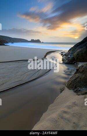 Porthcurno Beach in West Cornwall captured at sunrise. Stock Photo