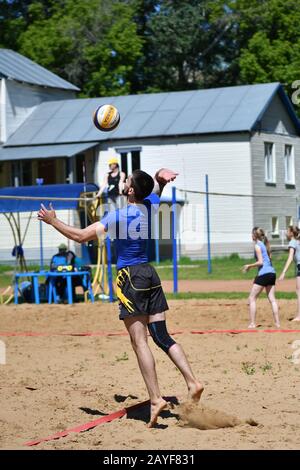 Orenburg, Russia, 9-10 June 2017 year: Boys playing beach volleyball on City tournament Beach Volley Stock Photo