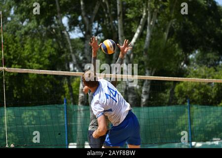 Orenburg, Russia, 9-10 June 2017 year: Boys playing beach volleyball on City tournament Beach Volley Stock Photo