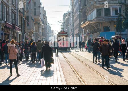 ISTANBUL, TURKEY - JULY 30, 2016: Retro tram on Istiklal street. Istanbul historic district. Istanbul famous touristic line. Red tram Taksim-Tunel. Stock Photo