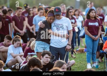 Parkland, Florida, USA. 14th Feb, 2020. People gather at Pine Trails Park in Parkland, in honor and commemoration of the 17 victims, two years after the shooting at Marjory Stoneman Douglas high school. Credit: Orit Ben-Ezzer/ZUMA Wire/Alamy Live News Stock Photo