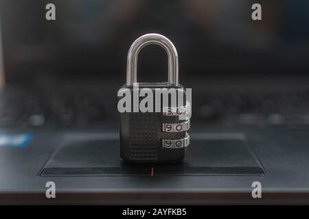 padlock on top of a laptop Stock Photo