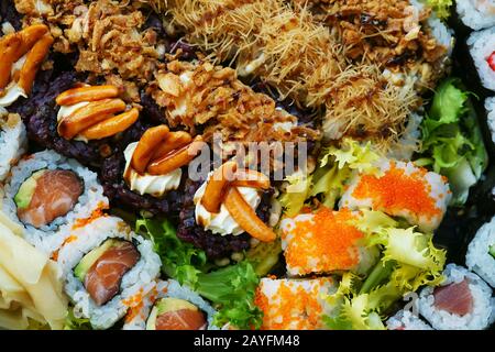 Sushi dish  - Japanese food: uramaki, maki, roll, special roll, hosomaki, californa roll Stock Photo