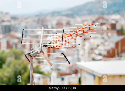 Antennas on the roof of a house Stock Photo