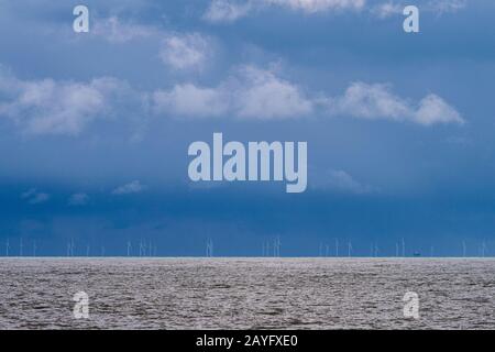 Stormy weather over the Rampion Windfarm off the coast of West Sussex, southern England, UK. Stock Photo