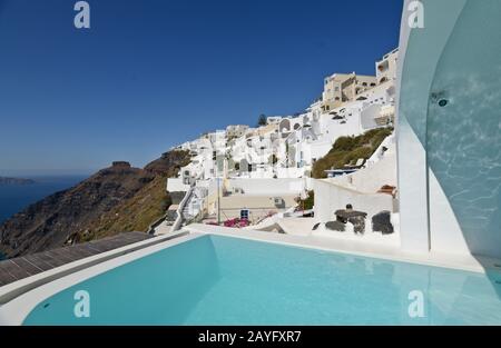 Swimming pool with view to the sea in Fira, Stantorini. Greece Stock Photo