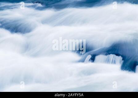 Slow shutter captured this nature abstract of the Patapsco River in Maryland on a cold winter day. Stock Photo