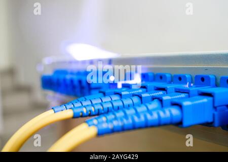 Batch wires are connected in the Optical Fiber Distribution Frame. The concept of high-speed Internet connection. Selective focus Stock Photo