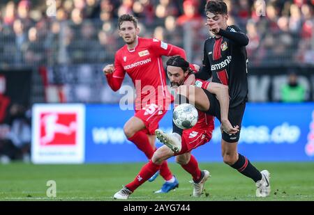 Duesseldorf, Germany. Paderborn, Deutschland. 15th Feb, 2020. 15 February 2020, Berlin: Football: Bundesliga, 1st FC Union Berlin - Bayer Leverkusen, 22nd matchday, An der Alten Försterei stadium. Berlin's Neven Subotic (M) fights for the ball against Kai Havertz (r) of Bayer Leverkusen. Berlin's Christopher Lenz runs to it. Photo: Andreas Gora/dpa - IMPORTANT NOTE: In accordance with the regulations of the DFL Deutsche Fußball Liga and the DFB Deutscher Fußball-Bund, it is prohibited to exploit or have exploited in the stadium and/or from the game taken photographs in the form of sequence ima Stock Photo