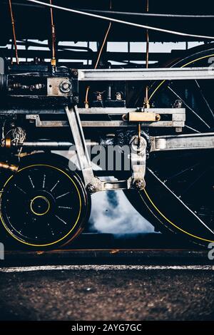 Wheels of a steam train at Dungeness station Stock Photo