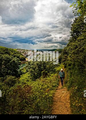 Hall Walk links Fowey and Polruan in Cornwall and is of exceptional beauty through woodland and creek and encompasses the  green waters of Pont Pills Stock Photo