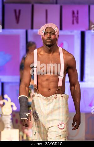 Boxer Richard Riakporhe modelling for Vin and Omi London Fashion