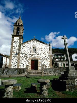 Spain, Galicia, La Coruña province. Church of San Andres de Teixido. View of the facade. It was built during the 16th and 18th centuries. Famous pilgrimage place of the most northern part of Spain. Stock Photo