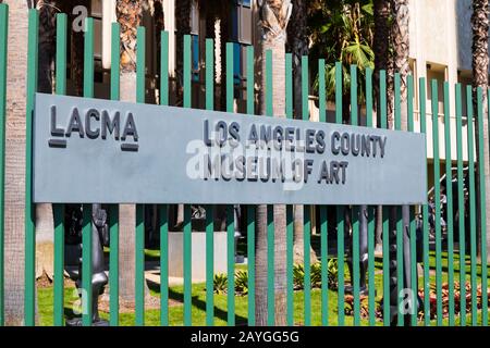 Los Angeles County Museum of Art sign on a green fence, LACMA, Wilshire Boulevard, los Angeles, California, USA Stock Photo
